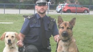 Con Dave Bartley with Ghost (right) and his second police dog Lucy