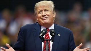 Donald Trump speaking at a campaign event in 2015