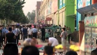 Crowd outside nursery in eastern China