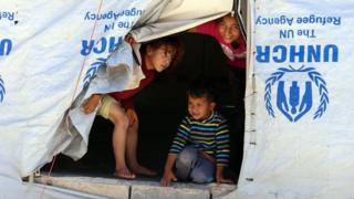 Беженцы в лагере беженцев Заатари в Иордании