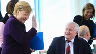 german-chancellor-hand-shake.