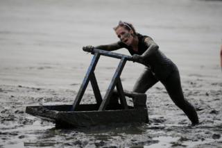 Competitors take part in the 2018 Mud Olympics in Brunsbüttel in northern Germany