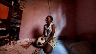 Ida Daniela Pouadjeu with her football