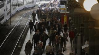 Commuters at Paris' Gare du Nord station pictured in June 2016