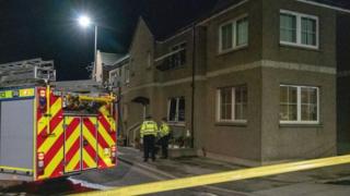 Police and fire engine at scene