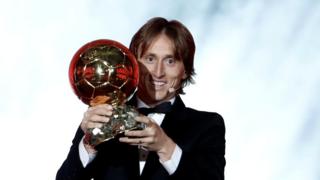 Modric is holding the prize