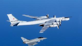Russian Bear aircraft escorted by a Royal Air Force Quick Reaction Alert Typhoon in September 2014