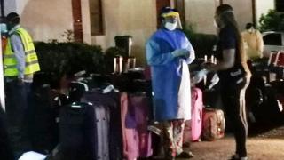 Naptip staff at the hotel monitoring their evacuation