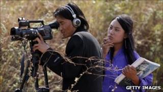 Bhutanese cameraman on location