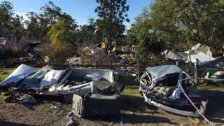 The incident left cars flattened and a house razed