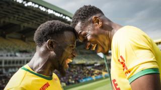 Nantes' Malian forward Kalifa Coulibaly (R) celebrates with Nantes' French midfielder Abdoulaye Toure after scoring a goal during the French L1 football match between Nantes (FCN) and Dijon (DFCO) at the Beaujoire stadium in Nantes, on May 5, 2019.