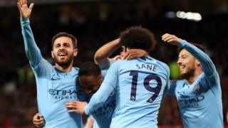 aworan awọn agbabọ́ọlu Man City