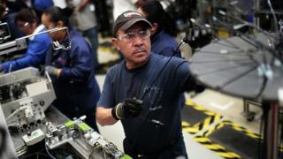 Workers in the auto parts production line of the Bosch factory in San Luis Potosi, Mexico