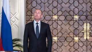 путін