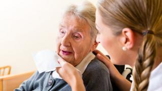 Woman and a carer
