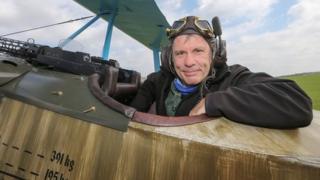 Bruce Dickinson in a World War 1 biplane