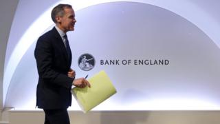 Mark Carney leaves after hosting a Financial Stability Report press conference at the Bank of England