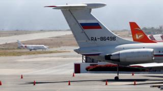 An airplane with the Russian flag is seen at Simon Bolivar International Airport in Caracas