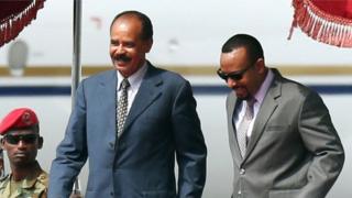 Eritrea's President Isaias Afwerki is welcomed by Ethiopian Prime Minister Abiy Ahmed upon arrival in Addis Ababa, 14 July 2018