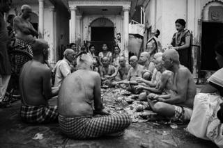 Men enjoy a meal