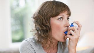 Woman with inhaler