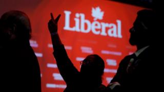 Liberal supporters react as they watch results roll in at Canadian Prime Minister Justin Trudeau's election night headquarters