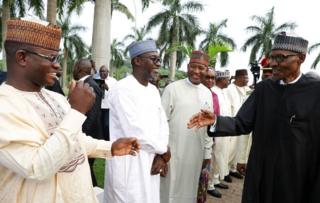 Nigeria"s President Muhammadu Buhari is received by some state governors at at Nnamdi Azikiwe airport in Abuja, Nigeria August 19, 2017 after his return from three months medical trip in Britain. Nigeria Presidency