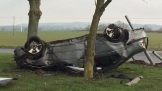 Car lying on its roof