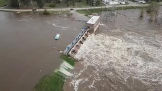 An aerial view of flooding as water overruns Sanford Dam, Michigan