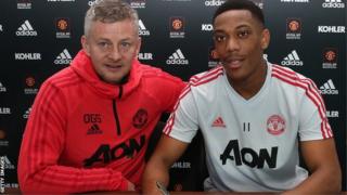 Manchester United interim boss Ole Gunnar Solskjaer with forward Anthony Martial