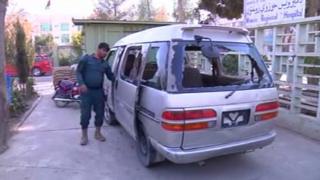 The minivan that was attacked by gunmen while carrying five female security staff at Kandahar airport