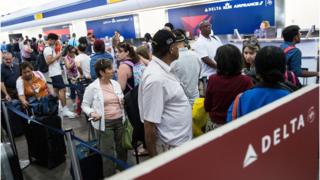 passengers waiting at delta terminal
