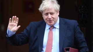 Prime Minister Boris Johnson leaves 10 Downing Street for PMQ's on March 25, 2020 in London, England.