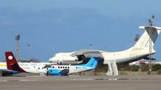 Planes on tarmac