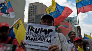 A pro-Gov Protest  Gainst US Sanction  a Signification Reading "  Venazeula" in Carracas on Augest 7, 2019