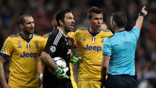 93rd minute: Buffon remonstrates too vociferously, screaming and pointing his finger in the direction of Oliver and is shown a red card.