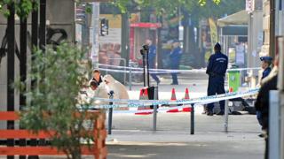 Forensic teams examine the scene of the blast on Sunday, September 25 2016.