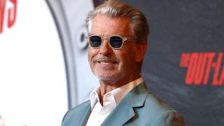 Actor Pierce Brosnan poses on the red carpet