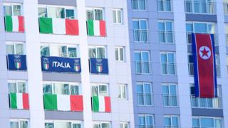 Italian and North Korean flags