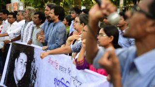 Bangladeshi secular activists take part in a protest against the killing of blogger Niloy Chakrabarti, who used the pen-name Niloy Neel, in Dhaka on August 11, 2015