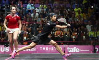 Nicol David of Malaysia competes with Colette Sultana of Malta during the squash preliminary round.