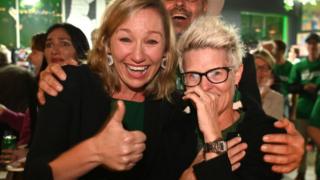 Greens Senator Larissa Waters and Senate candidate Penny Allman-Payne celebrate a strong result for the party