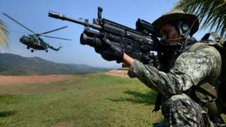 Peruvian soldiers take part in operations against drug trafficking about 280km (170 miles) southeast of the capital Lima - 6 August 2015