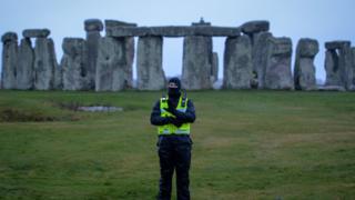security-guard-stands-at-closed-stonehenge-site