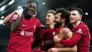 Liverpool's players celebrate with goalscorer Mohamed Salah during the 7-0 rout of Manchester United at Anfield