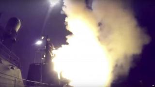 Image grab made from a video made available on the Russian Defence Ministry website of cruise missile strike from Caspian Sea.