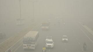 Vehicles ply on road amid heavy smog, at NH 9 road, on November 3, 2019 in Ghaziabad, India.