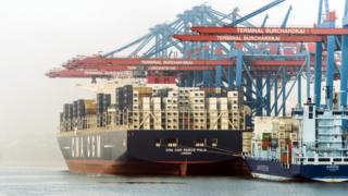 The Marco Polo docks at a container terminal in Hamburg harbour.