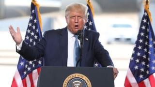 US President Donald Trump speaks during a campaign rally at the Defense Contractor Complex.