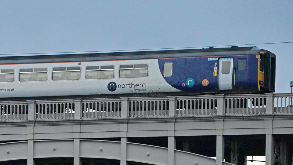 A Northern train travels along the High Level Bridge which carries both rail and road traffic across the Tyne between Newcastle upon Tyne and Gateshead